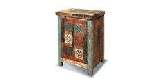 an old wooden cabinet with many different colors and designs on the doors, side by side