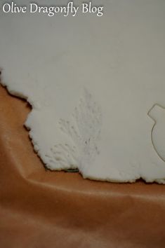 a close up of a piece of cake with frosting on the top and bottom