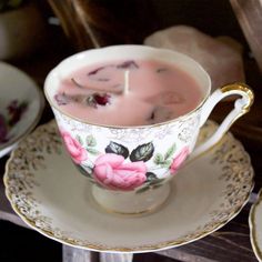 tea cups and saucers with flowers on them