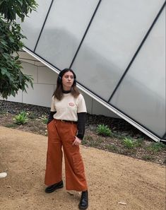 Burnt Orange Cargo Pants Outfit, Clay Pants Outfit, Burnt Orange Linen Pants Outfit, How To Style Orange Pants, Fall High-waist Parachute Pants With Pockets, Fall Utility Parachute Trousers, Fall Cargo Style Mid-rise Parachute Pants, Rust Pants Outfit, Burnt Orange Cargo Pants