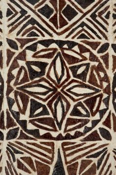 an intricately designed tile with brown and white designs on the outside, in shades of brown