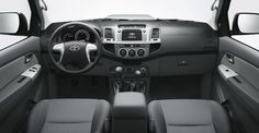 the interior of a vehicle with dashboard and dash lights