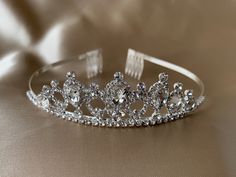 ❤ Please visit my shop for more flower girl accessories! https://www.etsy.com/shop/FromClareWithLove?ref=simple-shop-header-name&listing_id=943292124&section_id=32556451 Flower Girl Rhinestone Crystal Tiara | First Communion Tiara | Crystal Flower Girl HeadPiece One size fits most (children and adults) Tiara Diameter 5 inches Height 1.5 inches Communion Tiara, Flower Girl Tiara, Flower Girl Headpiece, Girls Tiara, Flower Girl Accessories, Gold Bridesmaid Dresses, Crystal Tiara, Hair Jewels, Tulle Flower Girl