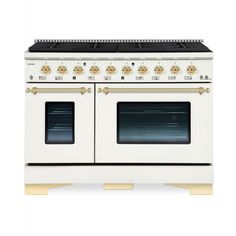 a white stove with two ovens on it's sides and gold trim around the burners