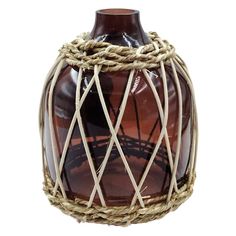 a brown vase with rope wrapped around the top and bottom, on a white background