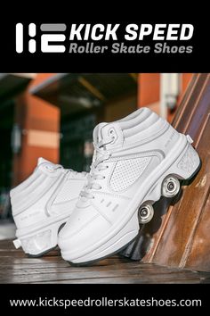 a pair of white roller skates sitting on top of a wooden floor