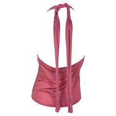 Presenting a fabulous bright pink Gucci knit halter top, designed by Tom Ford. From the late 1990s, this top features a v-neckline, exposed back, and tie at the neck. From over 20 years ago, this top is made complete with the original tags still attached. Add this elevated Gucci by Tom Ford closet staple to your wardrobe! Approximate measurements: Size - XL Bust: free Waist: 30 - 34" Luxury Gucci Summer Top, Casual Pink Gucci Top, Chic Gucci Evening Tops, Elegant Sleeveless Gucci Top, Chic Luxury Gucci Tops, Luxury Sleeveless Gucci Tops, Chic Gucci Luxury Tops, Gucci Knit, Velvet Gucci