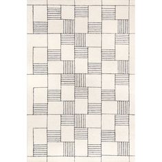 a white rug with black squares and lines on the floor, in front of a white background