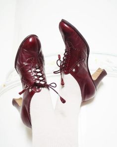 Amazing and rare burgundy 1930s shoes with cut outs<3  Beautiful open lacing and details... Handmade by Lindbloms in Kumla, Sweden. Marked size EU 39,  but see measurements: Inside length 25.3 cm/ 9.96"  Heels are 7 cm/ 2.75"  and they are 8.6 cm/ 3.38" wide underneath  Excellent condition. New rubber soles. Vintage Lace-up Fall Heels, Vintage Red Heels For Fall, Vintage Burgundy Heels For Formal Occasions, Classic Burgundy Almond Toe Heels, Vintage Wingtip Heels With Brogue Detailing, Vintage Pointed Toe Heels With Brogue Detailing, Vintage Heels With Brogue Detailing And Round Toe, Vintage Heels With Brogue Detailing And Almond Toe, Vintage Burgundy Heels With Round Toe