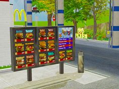 a mcdonald's menu board on the side of a road