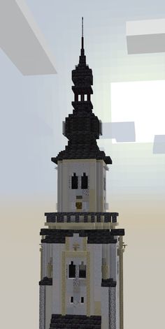 a large white tower with a clock on it's side and a sky background