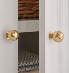 an open door with two knobs on it