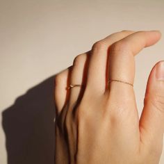 Delicate link chain ring, subtle sparkles in the light. It slips comfortably on your finger. Made of 10K yellow gold. Chain thickness is 1 mm. Dainty Everyday Ring With Chain Detail, Dainty Gold Chain Ring With Delicate Detail, Minimalist Tarnish-resistant Chain Ring, Elegant Tarnish-resistant Chain Ring, Elegant Gold Chain Ring, Tarnish Resistant, White Gold Jewelry, Yellow Gold Chain, Solid Gold Jewelry, Chain Ring