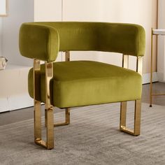 a green chair sitting on top of a carpeted floor