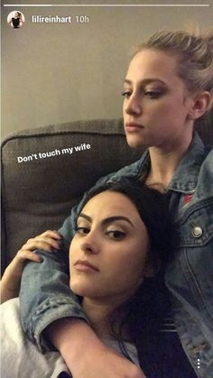 two women sitting next to each other with their arms around one another and the caption says, don't touch my wife