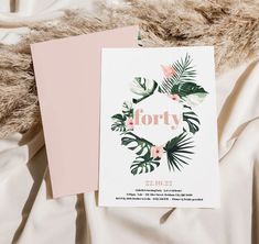 two greeting cards with the word forty printed on them next to a furnishing