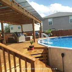 an above ground swimming pool with deck and patio furniture