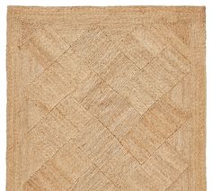 an area rug made out of jute and woven with squares in the middle, on a white background