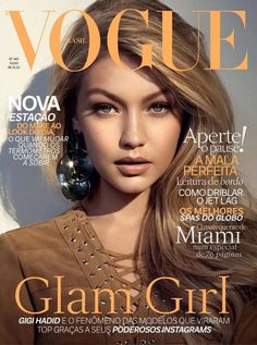 a woman with long hair on the cover of a magazine, wearing large hoop earrings