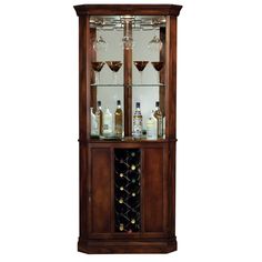 a tall wooden cabinet with wine glasses and bottles