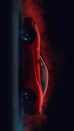 a red sports car is shown from above