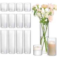 there are many vases and candles with flowers in them