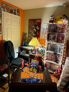 a living room filled with furniture and lots of clutter on the floor next to a book shelf