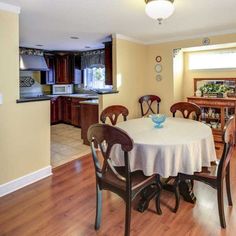 the dining room table is set for four