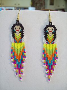 the earrings are made out of plastic beads