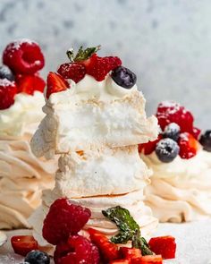 some very tasty looking desserts with berries on them