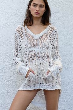 Find the Naxos White Sheer Crochet Hoody Sweater at BohoPink.com! Cute white crochet sweater with kangaroo pocket. Express shipping is available.