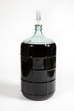 a black container with a glass top on a white background