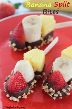 chocolate covered strawberries and bananas on a red plate