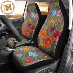 the interior of a car with colorful flowers on it