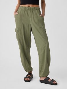 This pair of pants is part of our water-saving Washwell program. Compared to conventional wash methods, Washwell has saved millions of liters of water since 2016. Smooth linen blend. Elasticized waist, faux fly. On-seam pockets, patch pockets at back and sides. Elasticized cuffs. #430652 Parachute Cargo, Water Saving, Pair Of Pants, Pull On Pants, Linen Blend, Patch Pocket, Fashion Inspiration, Casual Pants, Gap