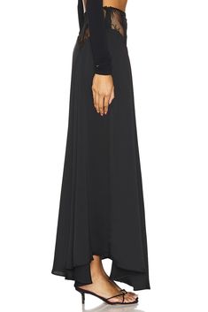 90% polyester 10% spandex.  Made in USA.  Dry clean only.  Unlined.  Hidden side zipper closure.  .  .  Skirt measures approx 41.5" in length.  .  .  .  .  .  .  .  . Asymmetrical Skirt With Side Zipper For Work, Workwear Asymmetrical Skirt With Side Zipper, Sleek Asymmetrical Lined Skirt, Stretch Flared Skirt For Workwear, Sleek Long Lined Skirt, Elegant Asymmetrical Skirt With Side Zipper, Sleek Stretch Lined Skirt, Fitted Bottoms With Long Inseam For Evening, Versatile Pleated Flared Skirt