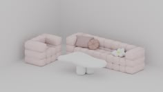 a living room with two couches and a table in the middle, one has a flower on it