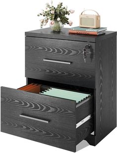 two drawers with file folders on top of them