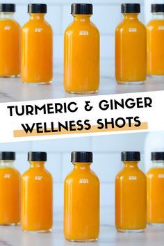 there are many bottles with orange juice in them and the words turmric & ginger wellness shots