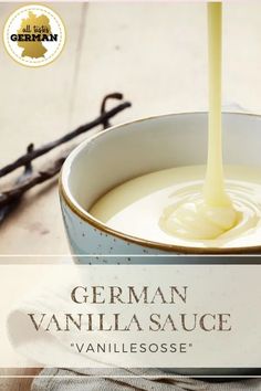 a bottle of vanilla sauce being poured into a bowl