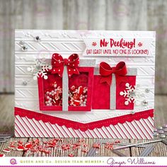 a handmade christmas card with red and white decorations