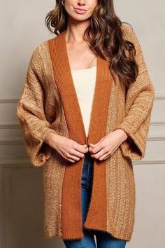 This rust colored chunky, open cardigan sweater is perfection for this Fall! 34% ACRYLIC 33% POLYESTER 33% COTTON. Fall Cardigan For Cold Weather, Textured Knit, Fall 3/4 Sleeve Cardigan, Oversized Fall Cardigan With 3/4 Sleeves, Brown Knit Open Front Cardigan, Cheap Orange V-neck Cardigan, Color Block Cardigan, Open Cardigan Sweater, Open Cardigan, Rust Color