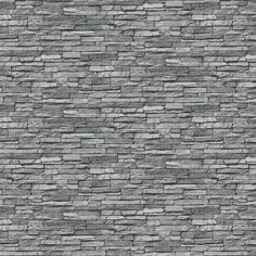 an image of a stone wall that looks like it is made out of grey bricks