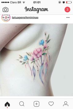 a woman's stomach with flowers on it