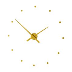 a clock with gold dots on it is shown in the middle of the image,