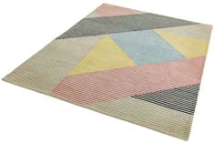 a multicolored rug with stripes and shapes