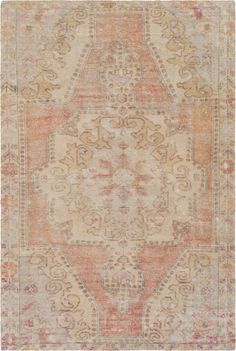 an orange and beige area rug with ornate designs on the bottom, in various colors