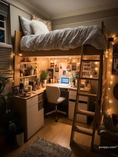 a loft bed with a desk underneath it and some lights on the wall above it