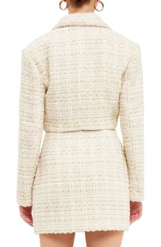 This woolly tweed jacket is designed in a cropped silhouette with golden buttons. Notched collar Lined 80% polyester, 20% wool Hand wash, dry flat Imported Chic Cream Tweed Blazer, Chic Cream Tweed Outerwear, Chic Cropped Tailored Tweed Jacket, Chic Cropped Tweed Jacket, Elegant Cropped Tweed Outerwear, Elegant Cream Cropped Jacket For Fall, Chic Cream Tweed Jacket For Office, Chic Cropped Tweed Outerwear, Chic Long Sleeve Cropped Tweed Jacket