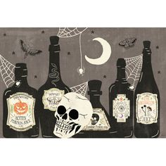 a group of bottles that are next to each other with a skull in the middle